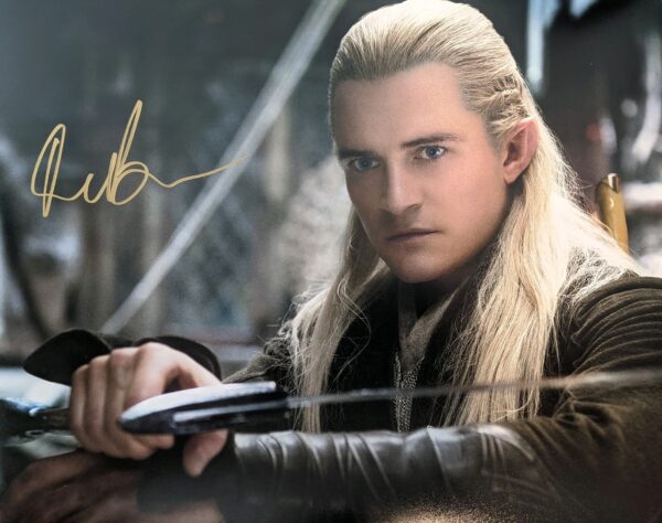 Orlando Bloom Signed Legolas with sword 11x14 w/ BAS